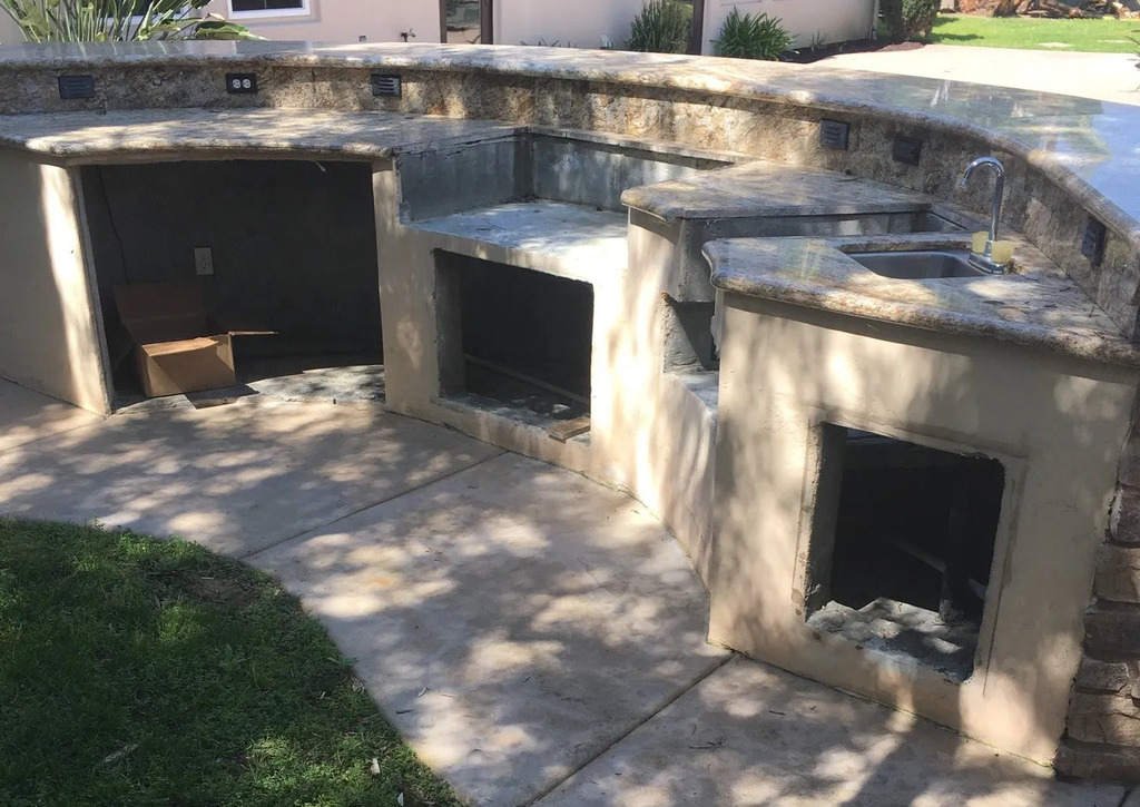 Outdoor kitchen concrete structure pre-installation.