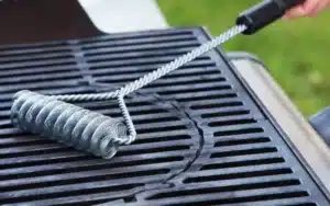 Grill cleaning with metal coil brush
