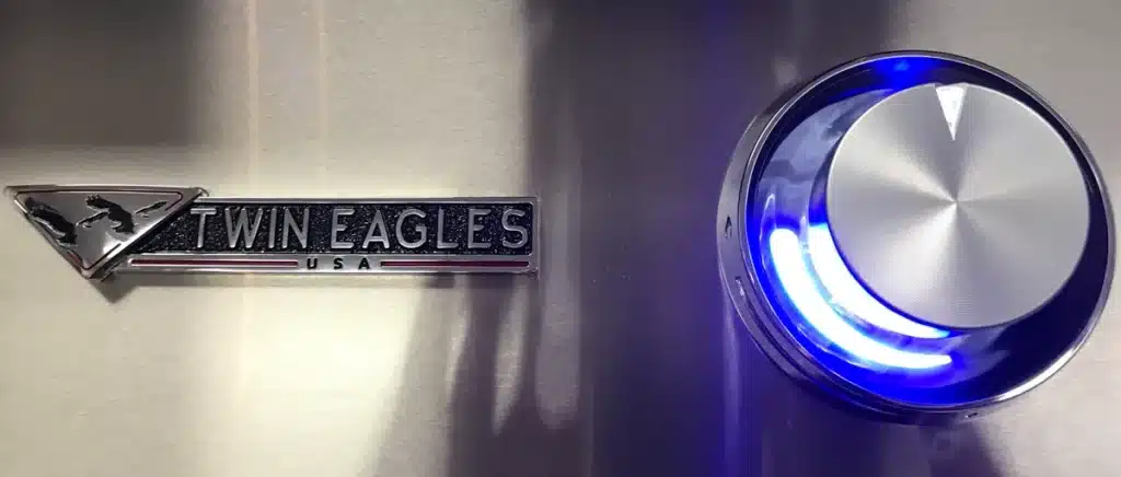 Close-up of Twin Eagles grill logo and knob