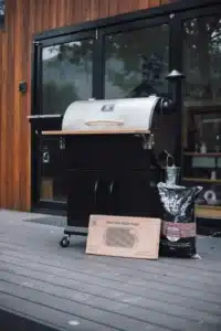 Detailed image of smoker grill with BBQ accessories